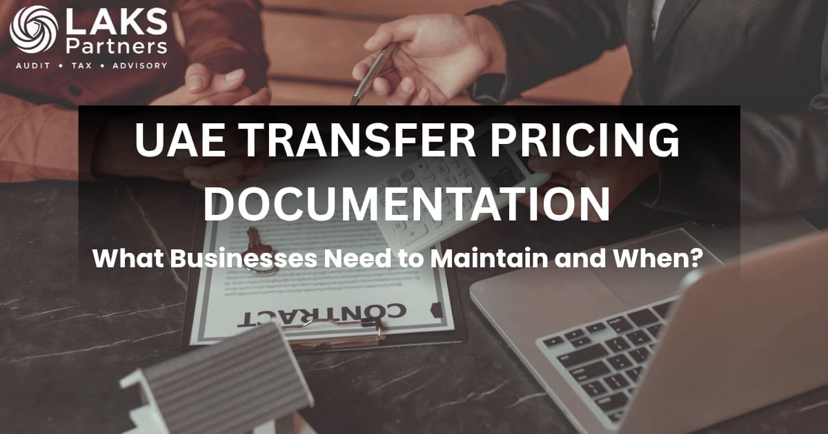 UAE Transfer Pricing Documentation — reviewing a contract and calculator across a desk, with the LAKS Partners logo
